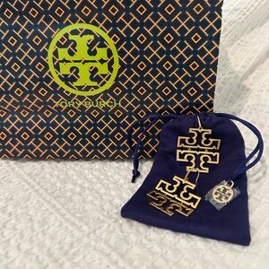 Tory Burch Gold. Britten Logo drop earrings in excellent condition.